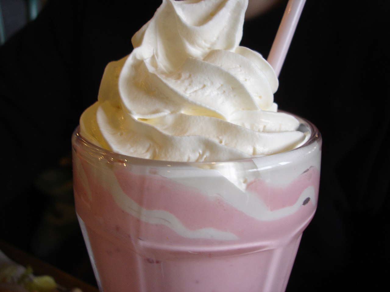 Strawberry milkshake with whipped cream