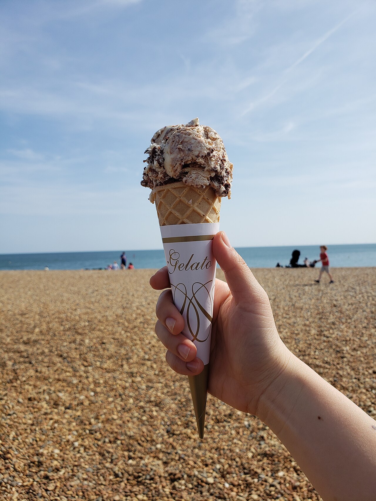 Enjoying an ice cream cone at the beach